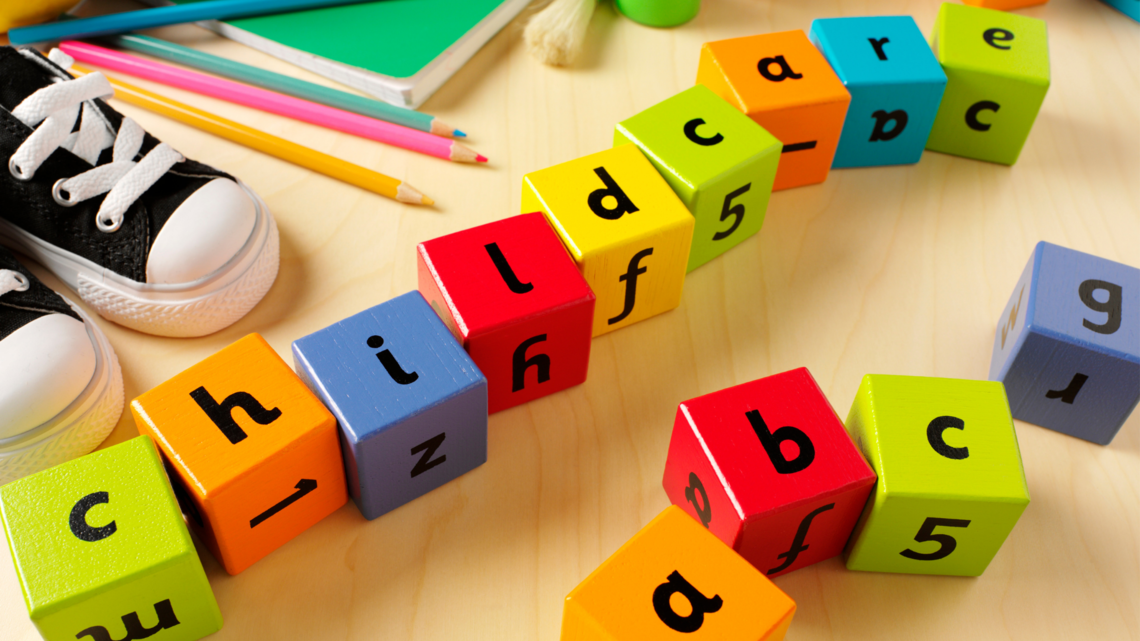 Photo of childcare spelled out in letters on colourful wooden blocks